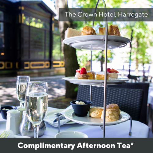 Afternoon Tea and glasses of champagne on a table at The Crown Hotel Harrogate